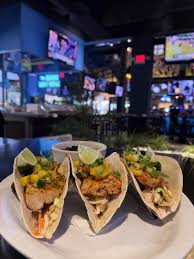 El Vez Fort Lauderdale signature dishes Mission ChickenHuevos RancherosCrispy Mahi-Mahi Tacos